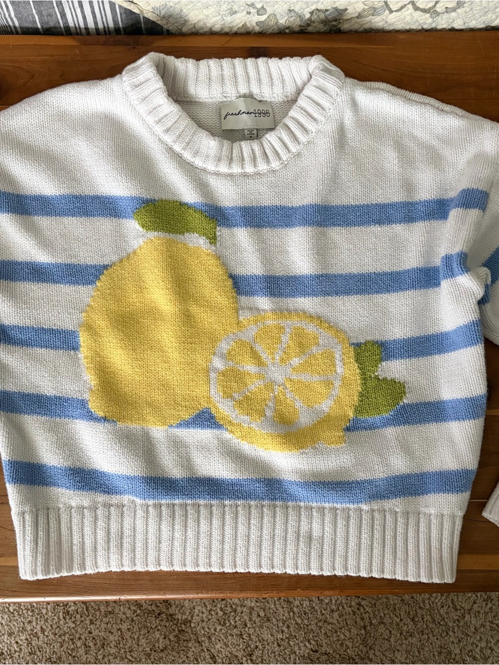 Freshman White Cropped Crewneck Sweater with Blue Stripes and Yellow Lemon Motif